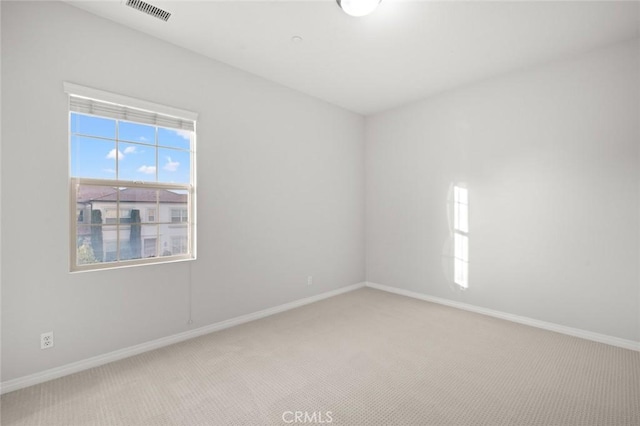 empty room featuring carpet floors