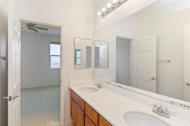 bathroom featuring vanity and ceiling fan