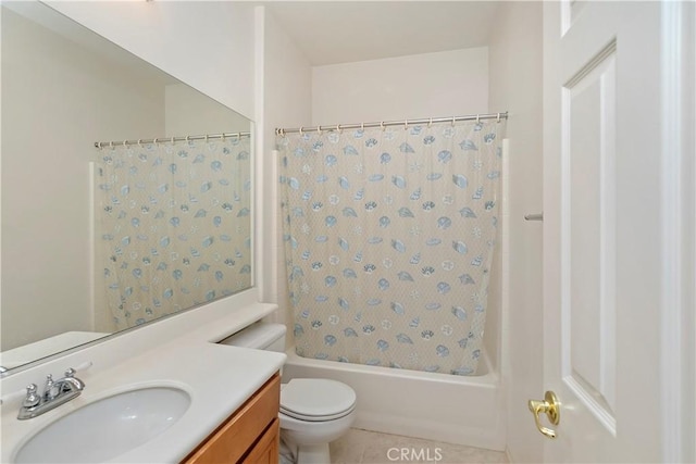 full bathroom featuring tile patterned flooring, toilet, vanity, and shower / bath combo with shower curtain