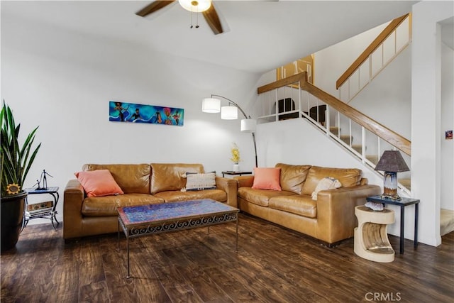 living room with ceiling fan, stairs, and wood finished floors