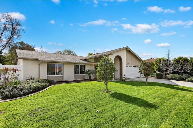 ranch-style house with a garage and a front lawn