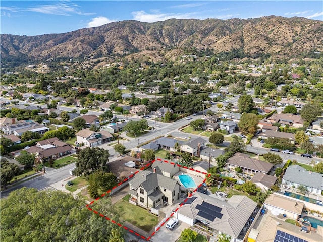 aerial view featuring a mountain view