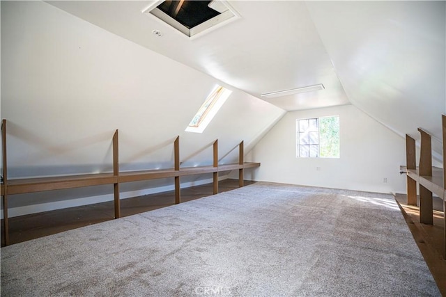 bonus room featuring vaulted ceiling