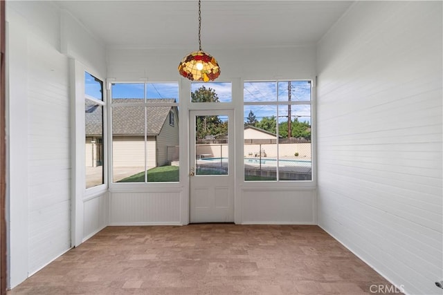 view of unfurnished sunroom