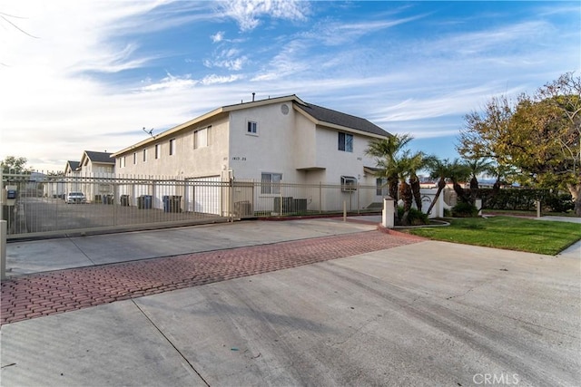 view of side of property featuring a yard