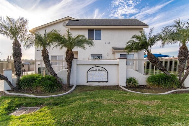 view of front of home with a front yard