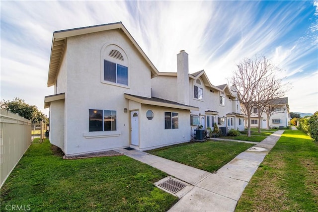 view of front of home with a front yard