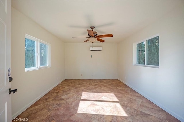 unfurnished room with an AC wall unit and ceiling fan