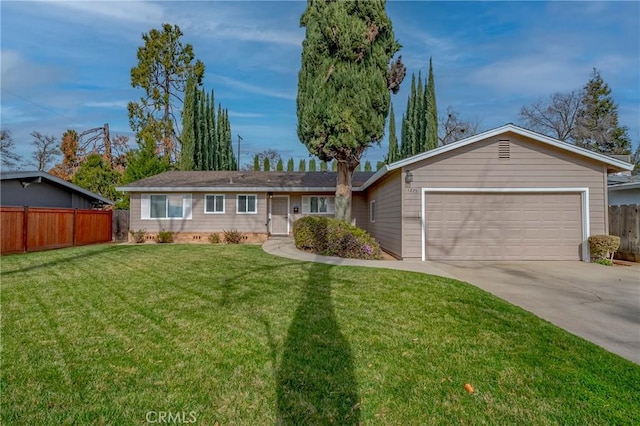 single story home with a garage and a front lawn