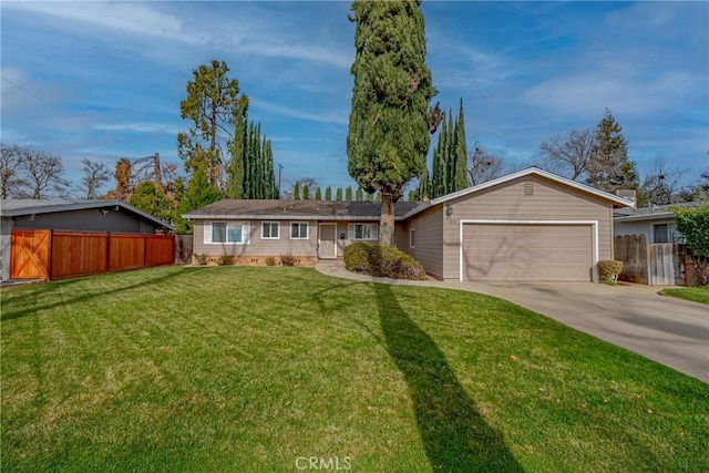 ranch-style house featuring a garage and a front lawn