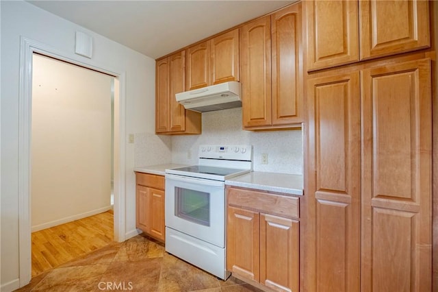 kitchen featuring white electric stove