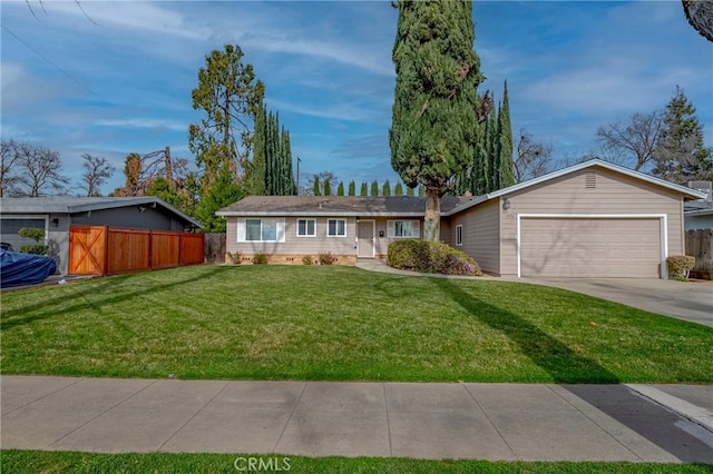 ranch-style house with a garage and a front lawn