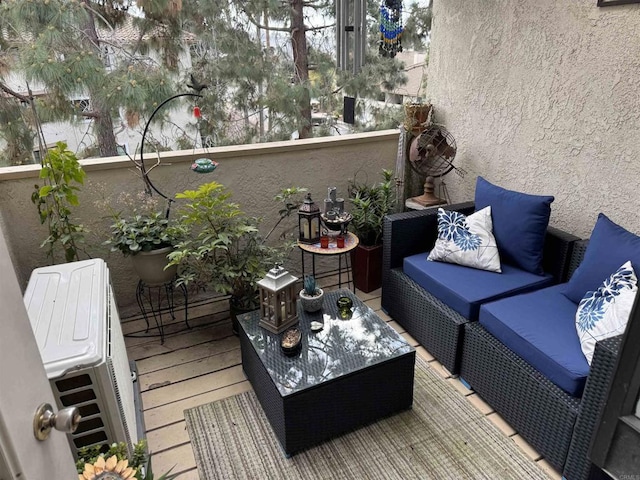 balcony with an outdoor hangout area