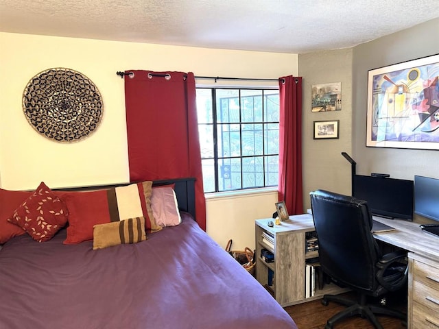 bedroom featuring a textured ceiling