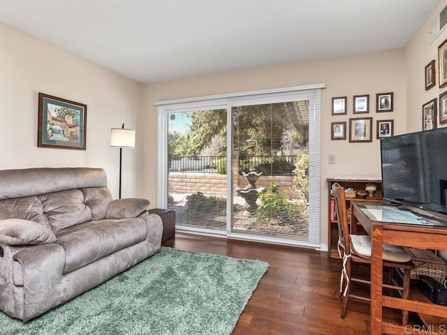 living room featuring dark hardwood / wood-style flooring