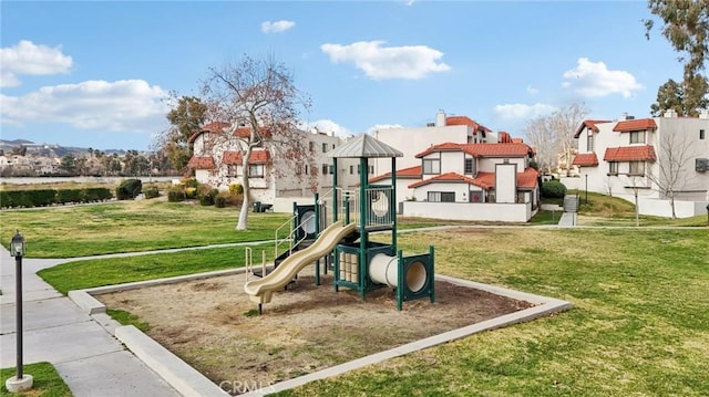 view of play area with a yard