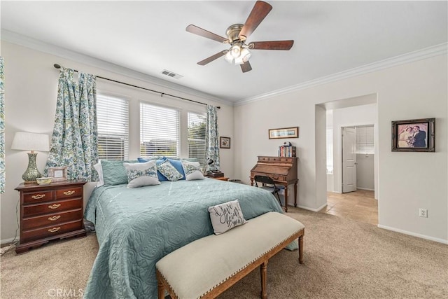 bedroom with crown molding, light colored carpet, and ceiling fan