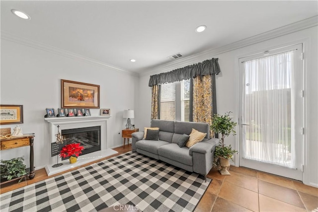 living room featuring crown molding