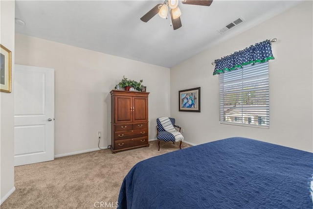 bedroom with light carpet and ceiling fan