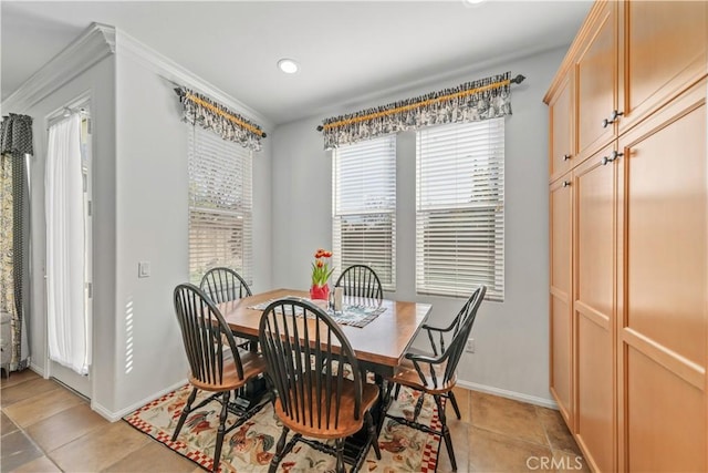 dining area with light tile patterned flooring