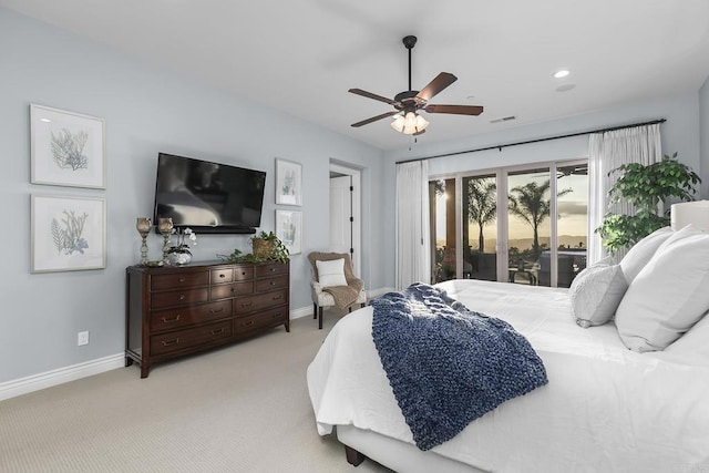 carpeted bedroom featuring access to exterior and ceiling fan