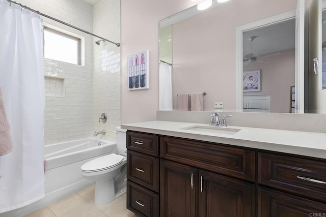 full bathroom featuring tile patterned floors, toilet, shower / tub combo, vanity, and ceiling fan