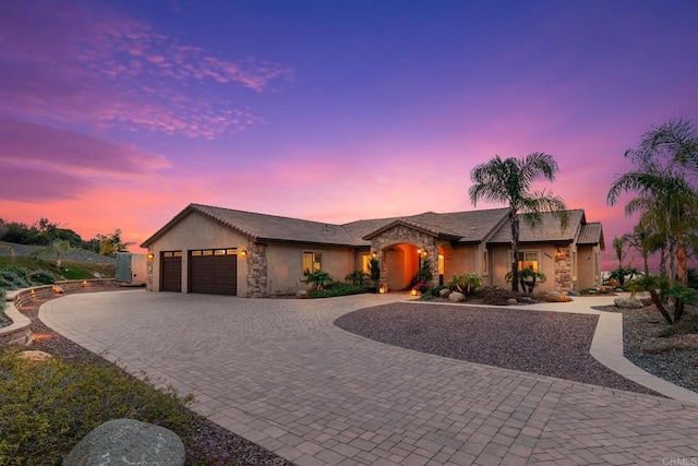 single story home with a garage