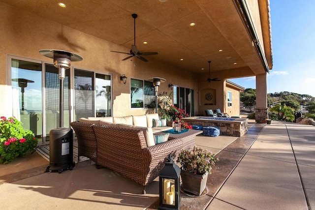 view of patio / terrace featuring an outdoor hangout area and ceiling fan