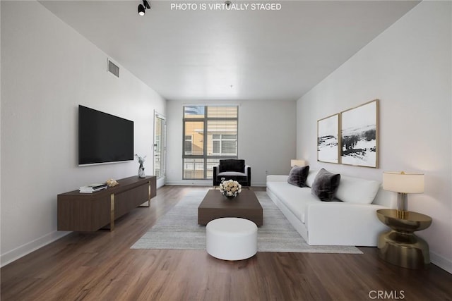 living room with hardwood / wood-style floors