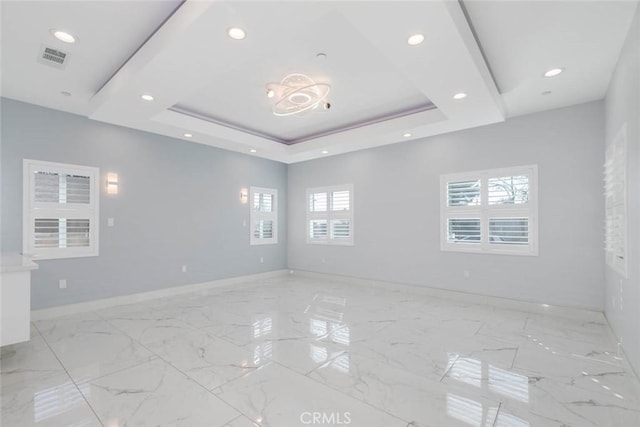 7631 Columbia St, Rosemead, CA 91770 - spare room featuring baseboards, recessed lighting, a tray ceiling, and light marble finish flooring