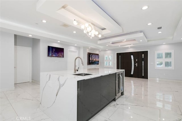 7631 Columbia St, Rosemead, CA 91770 - kitchen featuring a sink, a tray ceiling, modern cabinets, light marble finish floors, and recessed lighting