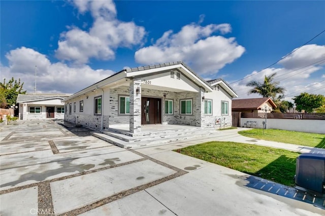 7631 Columbia St, Rosemead, CA 91770 - view of front facade with a porch and stone siding