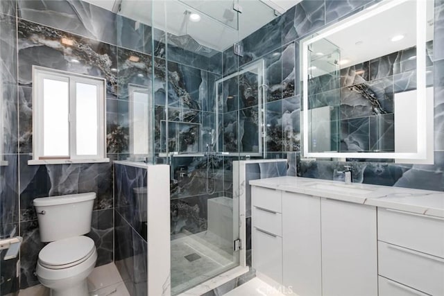 7631 Columbia St, Rosemead, CA 91770 - full bathroom with tile walls, a shower stall, vanity, and toilet