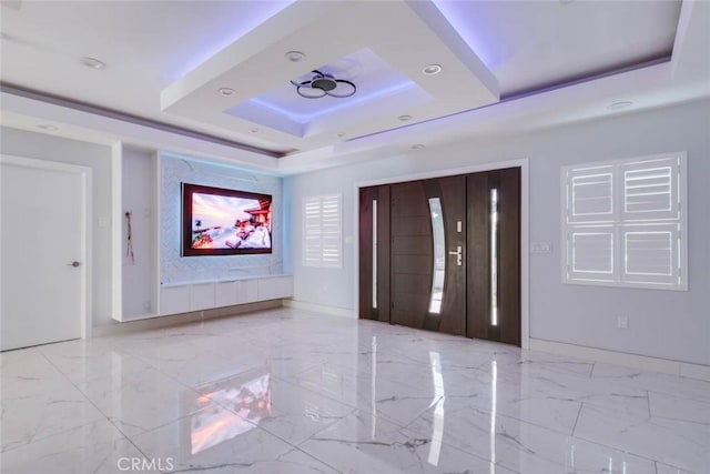 7631 Columbia St, Rosemead, CA 91770 - entryway featuring a tray ceiling, marble tiled floors, baseboards, and recessed lighting
