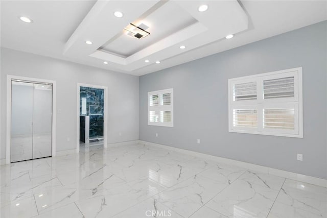 7631 Columbia St, Rosemead, CA 91770 - unfurnished room with recessed lighting, baseboards, a raised ceiling, and light marble finish flooring