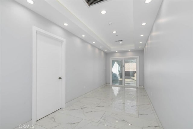 7631 Columbia St, Rosemead, CA 91770 - corridor featuring recessed lighting, light marble finish floors, baseboards, and a raised ceiling
