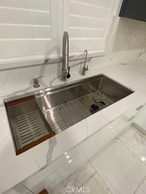 7631 Columbia St, Rosemead, CA 91770 - detailed view of a sink and light stone countertops