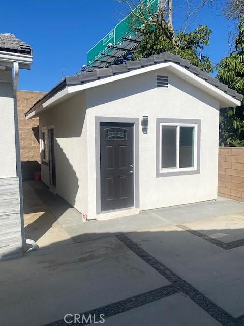 7631 Columbia St, Rosemead, CA 91770 - view of exterior entry with a patio area and stucco siding