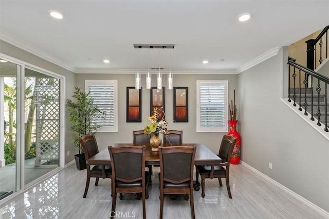 dining room with crown molding