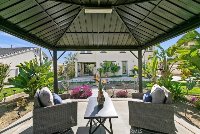 view of patio / terrace with a gazebo and outdoor lounge area