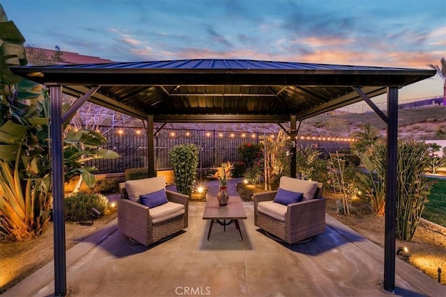 patio terrace at dusk with a gazebo