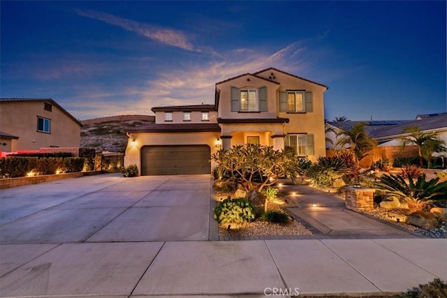 view of front of property featuring a garage