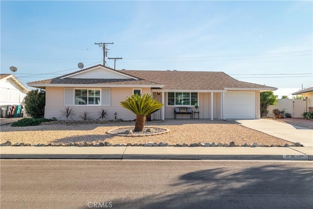 ranch-style house featuring a garage