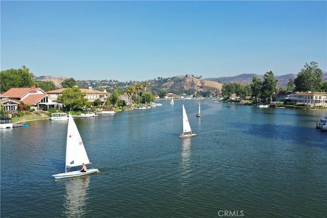 property view of water featuring a mountain view