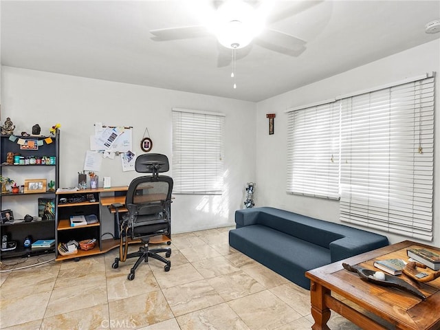 office area with ceiling fan