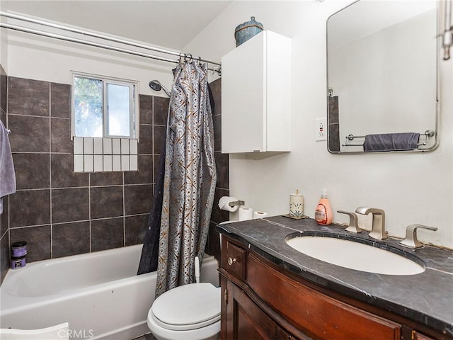 full bathroom with vanity, shower / bath combination with curtain, and toilet