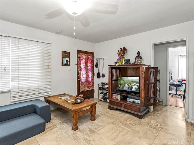 living room with ceiling fan