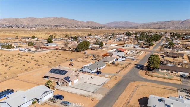 drone / aerial view featuring a mountain view