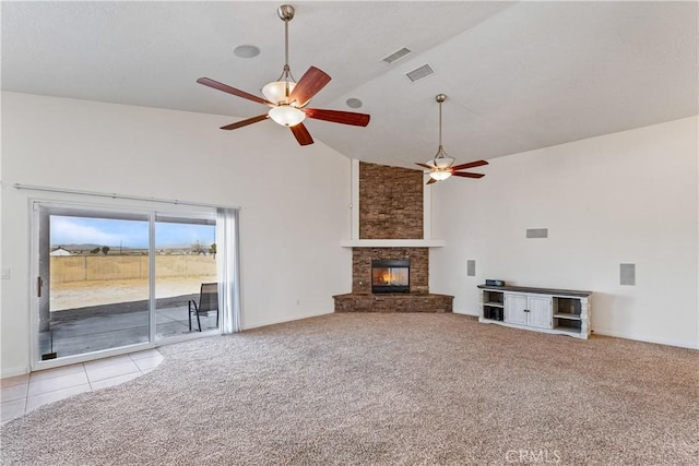 unfurnished living room with high vaulted ceiling, a fireplace, light colored carpet, and ceiling fan