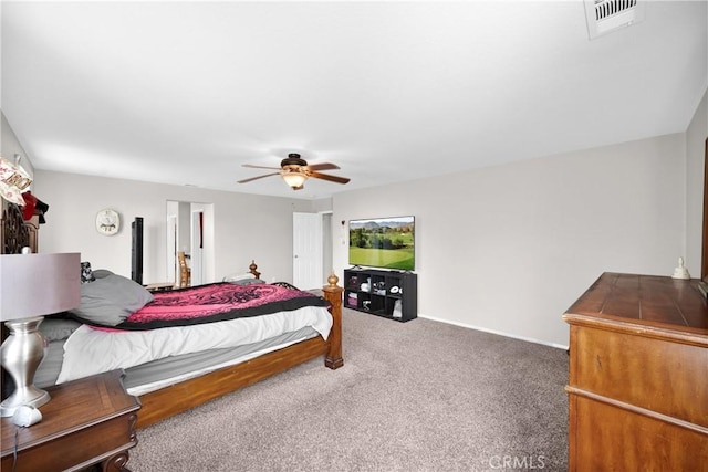 bedroom featuring carpet floors, visible vents, and ceiling fan